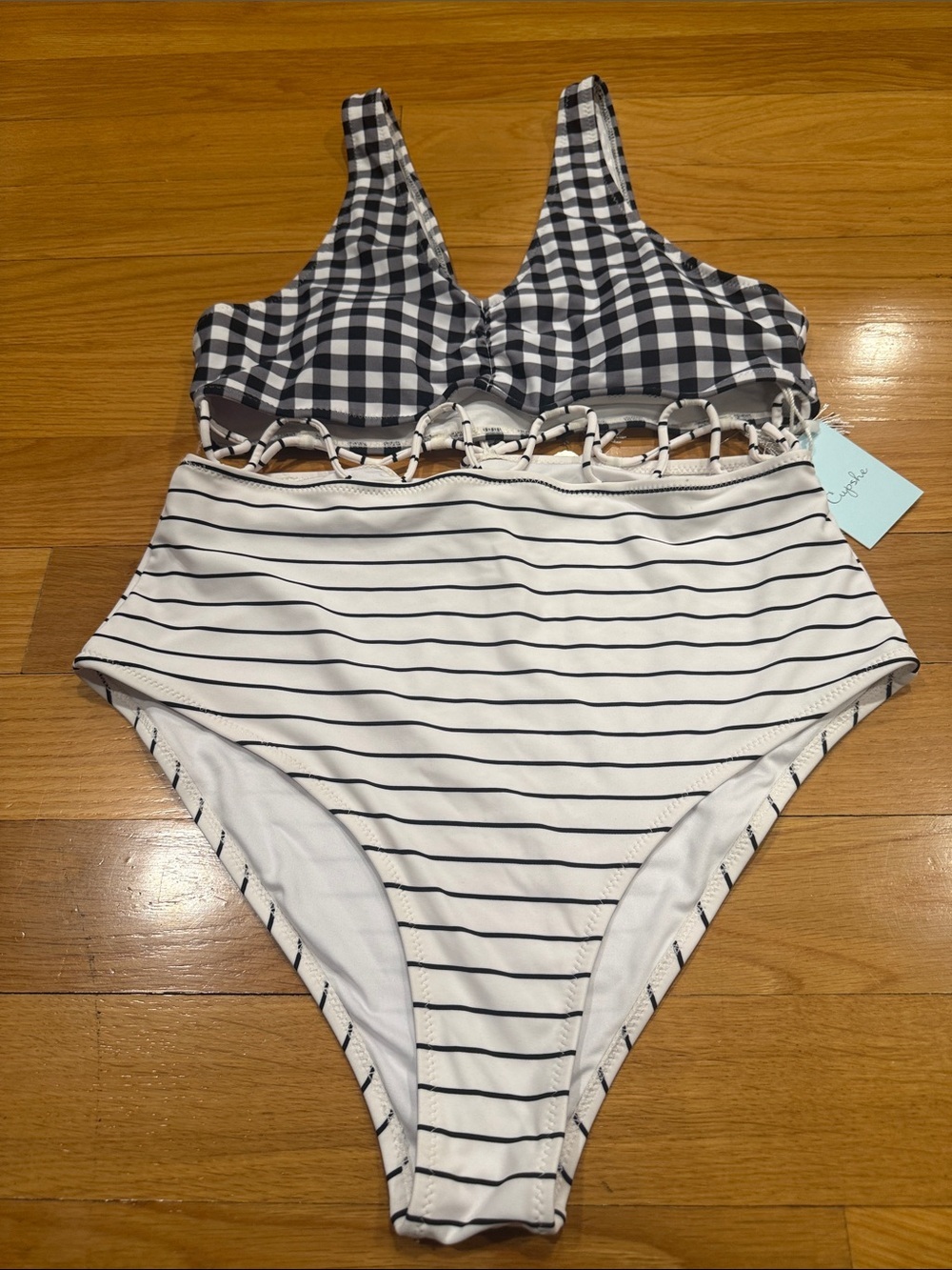 NWT  women’s vneck one piece swimsuit size large.